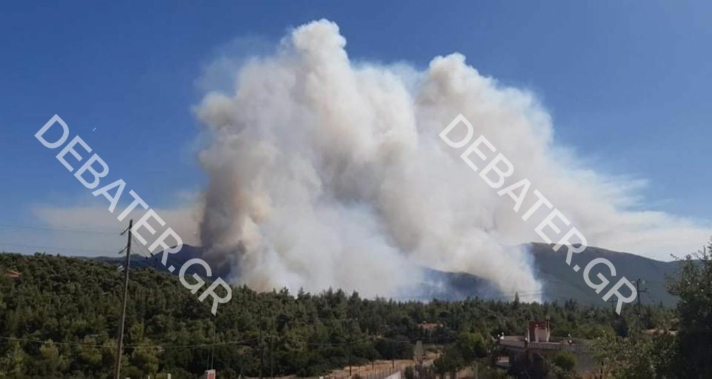 Εκκενώνονται οικισμοί στα Βίλια – Μεγαλώνει το πύρινο μέτωπο – Εμπρησμό βλέπει ο δήμαρχος Μάνδρας