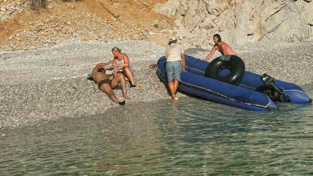 Διάσωση μετανάστη στη Σύμη -Δείτε φωτογραφίες του DEBATER