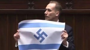 Πολωνία: Ακροδεξιός βουλευτής σήκωσε σημαία Ισραήλ με σβάστικα στη Βουλή